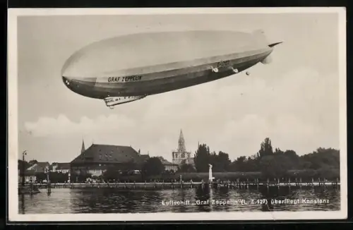 AK Konstanz, Luftschiff Graf Zeppelin über dem Wasser