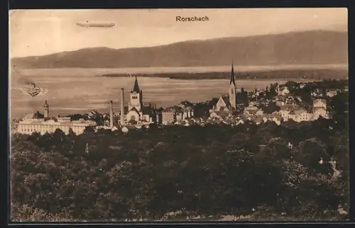 AK Rorschach, Ortspanorama mit fliegendem Zeppelin
