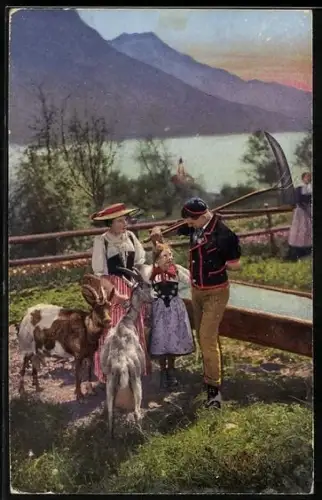 AK Schweiz, Familie in Tracht mit Ziegen