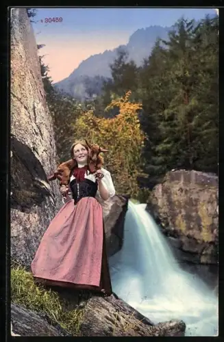 AK Schweiz, Frau in Tracht mit Ziege