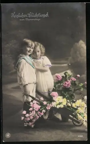 Foto-AK NPG Nr. 3383: Kinderpaar mit Blumenkarren, Geburtstagsgruss