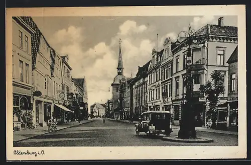 AK Oldenburg i. O., Strassenszene mit Kirche und Geschäften