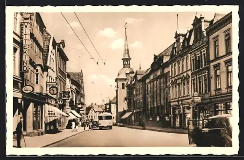 AK Oldenburg i. O., Langestrasse, Strassenansicht, Geschäfte, Kirche