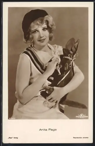 AK Schauspielerin Anita Page mit einem Stofftier