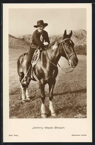 AK Schauspieler Jonny Mack Brown mit Cowboyhut auf seinem Pferd