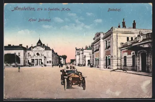 AK Amstetten, Strassenpartie am Bahnhof mit Hotel