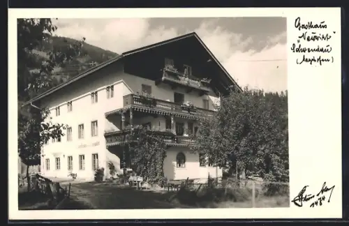 AK Schwendau, Gasthaus Neuwirt mit Bergen