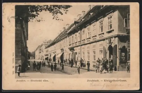 AK Josefstadt, Königgrätzer Gasse mit Geschäften und Kindergruppe, Strassenpartie
