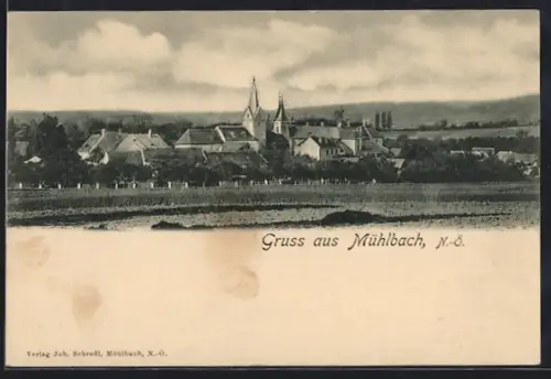 AK Mühlbach /N.-Ö., Ortspanorama mit Türmen von einem Feld aus