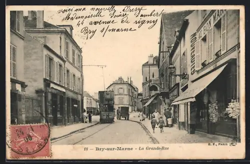 AK Bry-sur-Marne, La Grande Rue avec tramway et passants
