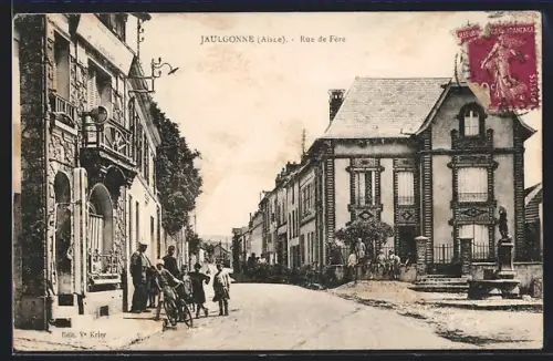 AK Jaulgonne /Aisne, Rue de Fère animée avec habitants et bâtiments historiques