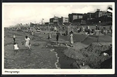 AK Wangerooge, Strand mit Badegästen und Strandkörben, Gebäude