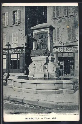 AK Marseille, Statue de Victor Gélu sur la place animée avec facades de magasins