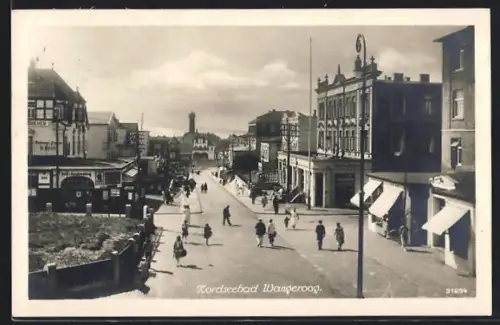 AK Wangeroog, Strassenpartie mit Blick auf Leuchtturm