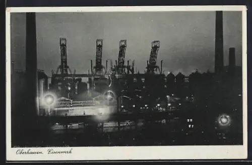 AK Oberhausen / Rheinland, Eisenwerk bei Nacht