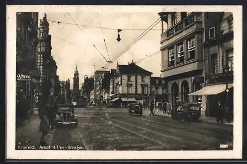 AK Krefeld, Strasse mit Geschäften