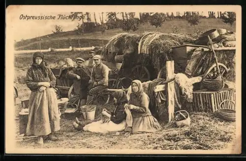 AK Ostpreussische Flüchtlinge mit einem Karren