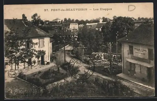 AK Pont-de-Beauvoisin, Les Etoppes, vue du village avec bâtiments et végétation environnante