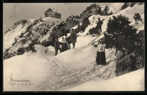 AK Rotwandhaus mit Wanderern im Schnee