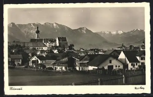 AK Murnau / Obb., Ortsansicht mit Kirche und Bergen