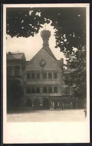 AK Litomerice, Ortspartie mit Geschäftshaus