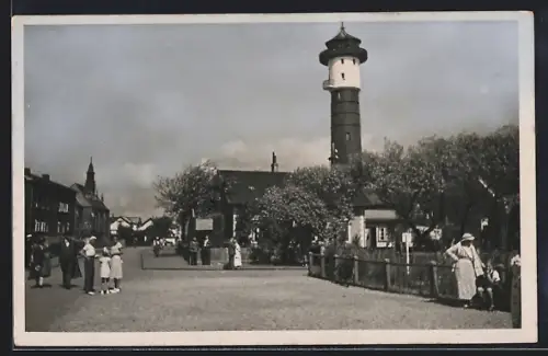 AK Wangerooge, Ortspartie mit Blick auf den Leuchtturm