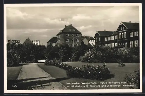 AK Wangerooge, Partie im Rosengarten mit Kinderheim Dr. Siemens und Oldenburger Kinderheim