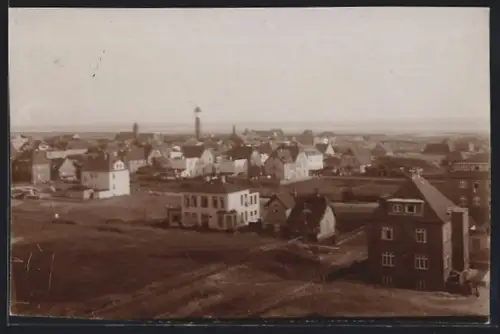 Foto-AK Wangerooge, Ortsansicht mit Leuchtturm aus der Vogelschau
