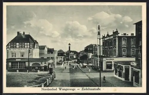 AK Wangerooge, Zedeliusstrasse mit Hotel Hanken und Leuchtturm im Hintergrund