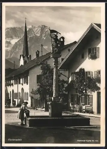 AK Garmisch-Partenkirchen, Floriansplatz mit Brunnen und Kirche