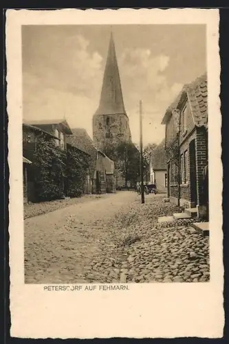 AK Petersdorf / Insel Fehmarn, Strassenpartie an der Kirche