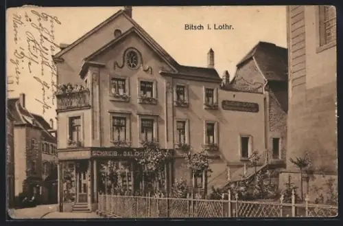 AK Bitsch i. Lothr., Geschäftshaus mit Schreibwarengeschäft A. Junker, Ortspartie