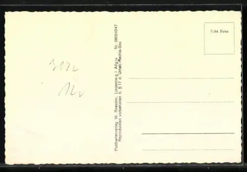 AK Isny i. Allg., Strassenpartie mit Geschäften durch Tor gesehen