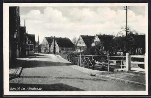 AK Borstel im Altenlande, Strassenansicht mit Fachwerkhäusern und Brücke