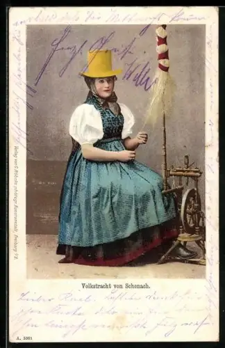 AK Schonach, Frau in Tracht am Spinnrad