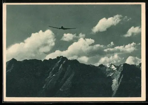 AK Gebirgsflieger über schroffen Graten
