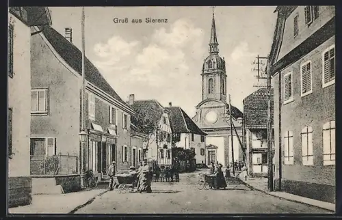 AK Sierenz, Vue de la rue principale et de l`église au fond