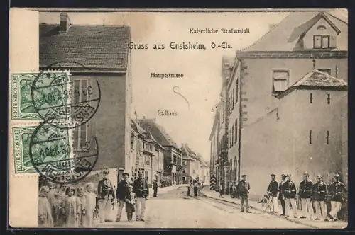 AK Ensisheim /O.-Els., Hauptstrasse mit Kaiserlicher Strafanstalt und Rathaus