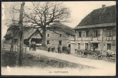 AK Saint Ulrich, Scène de rue avec charrette et maisons traditionnelles
