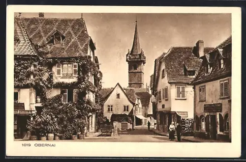 AK Obernai, Vue de la rue principale avec tour et maisons à colombages