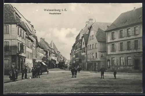 AK Weissenburg i. E., Hauptstrasse mit Passanten