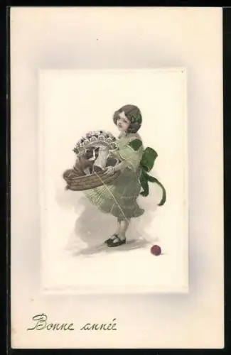 Künstler-AK V.K., Vienne Nr. 5067: Kleines Mädchen mit Katze im Korb, Neujahrsgruss