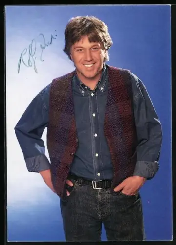 AK Musiker Rolf Zuckowski lächelnd im Porträt, Autograph