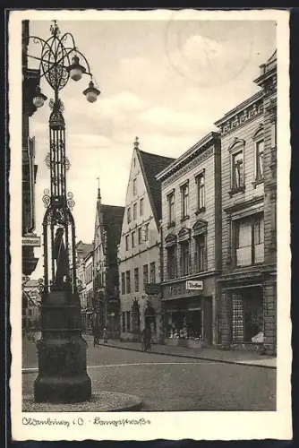 AK Oldenburg i. O., Häuser in der Langestrasse, historische Strassenlaterne