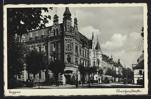 AK Troppau, Olmützerstrasse mit Turm-Eckgebäude