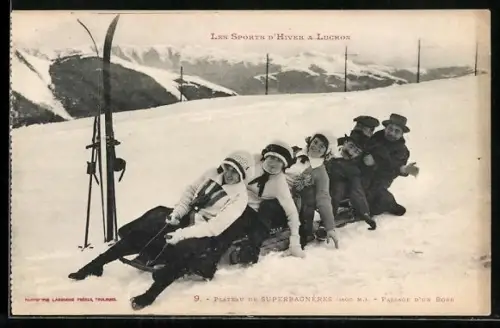 AK Superbagneres, Passage d`un Bobb, Paare auf einem Schlitten