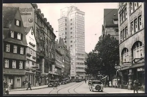 Foto-AK Stuttgart, Restaurant Schellmann, Cafe Eberhardbau, Strassenbahn