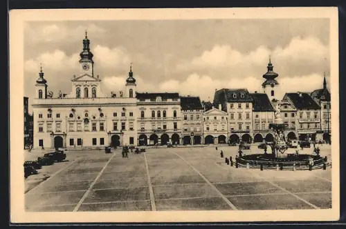 AK Budweis-Ceske Budejovice, Ringplatz mit Rathaus, Gasthof von Hosek, Buchhandlung, Kravatny Pradlo