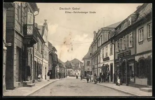 AK Deutsch Gabel, Zittau-Reichenberger Strasse mit Geschäften
