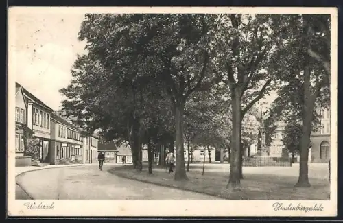 AK Walsrode, Strassenpartie am Hindenburgplatz mit Radfahrer